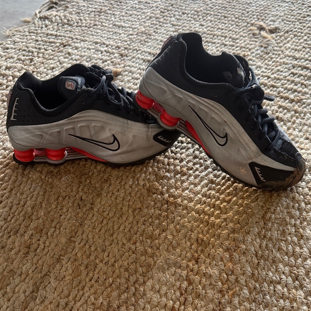 Nike Shox Black and Gray Sneakers with Red Accents
